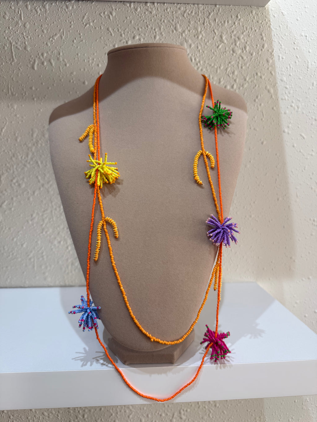 Collar pompón