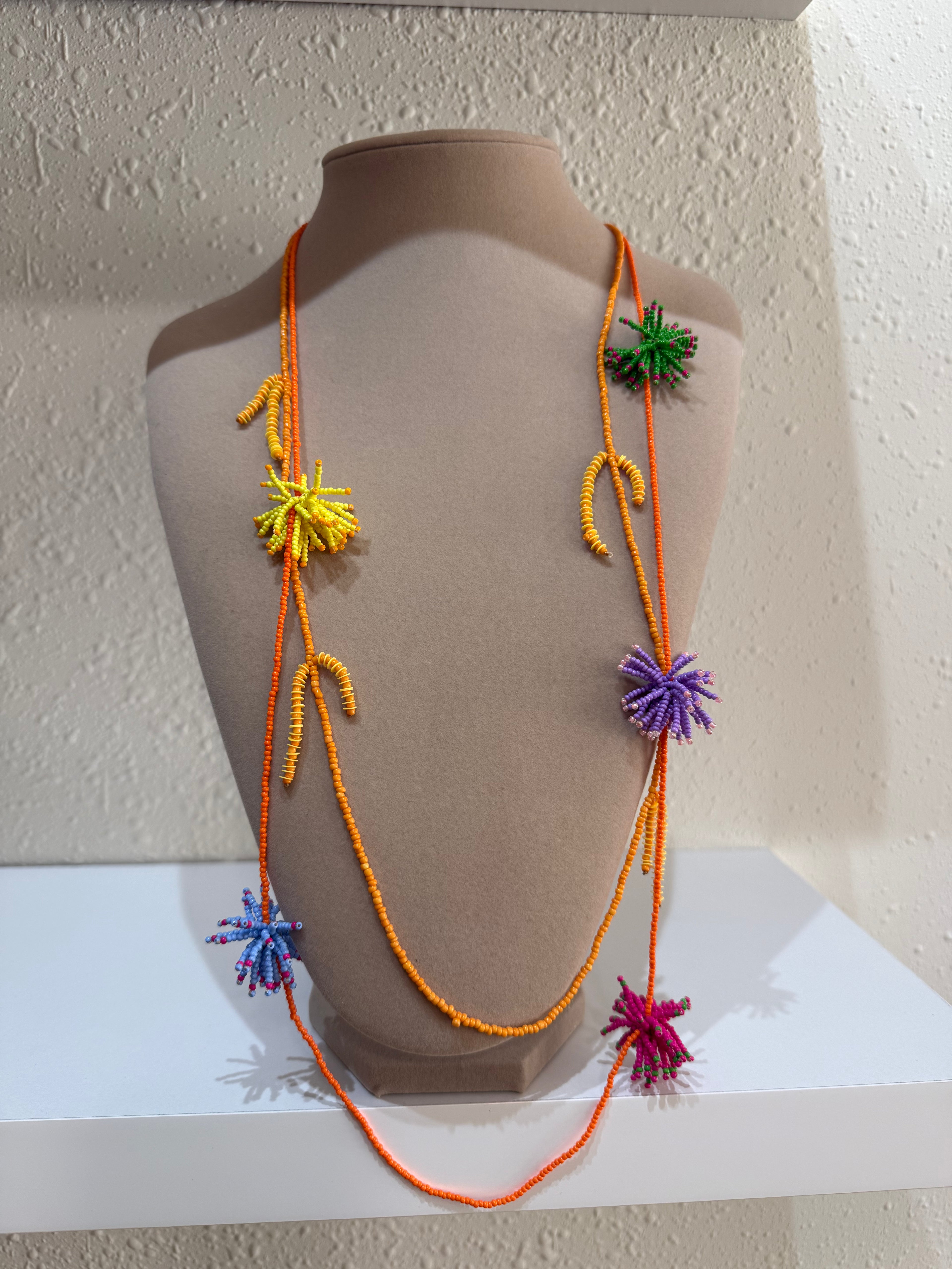 Collar pompón